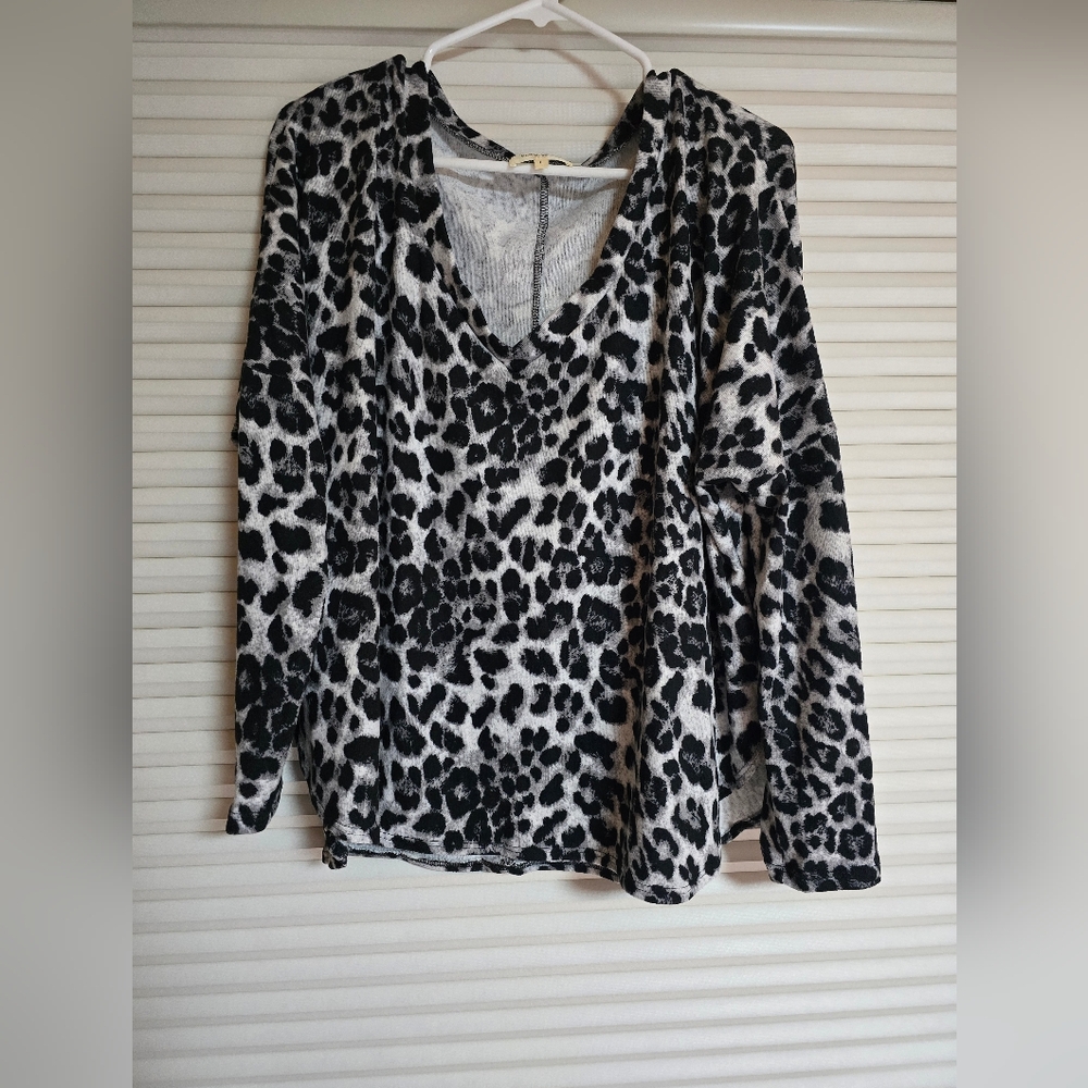 Woman's long sleeved, soft animal print top